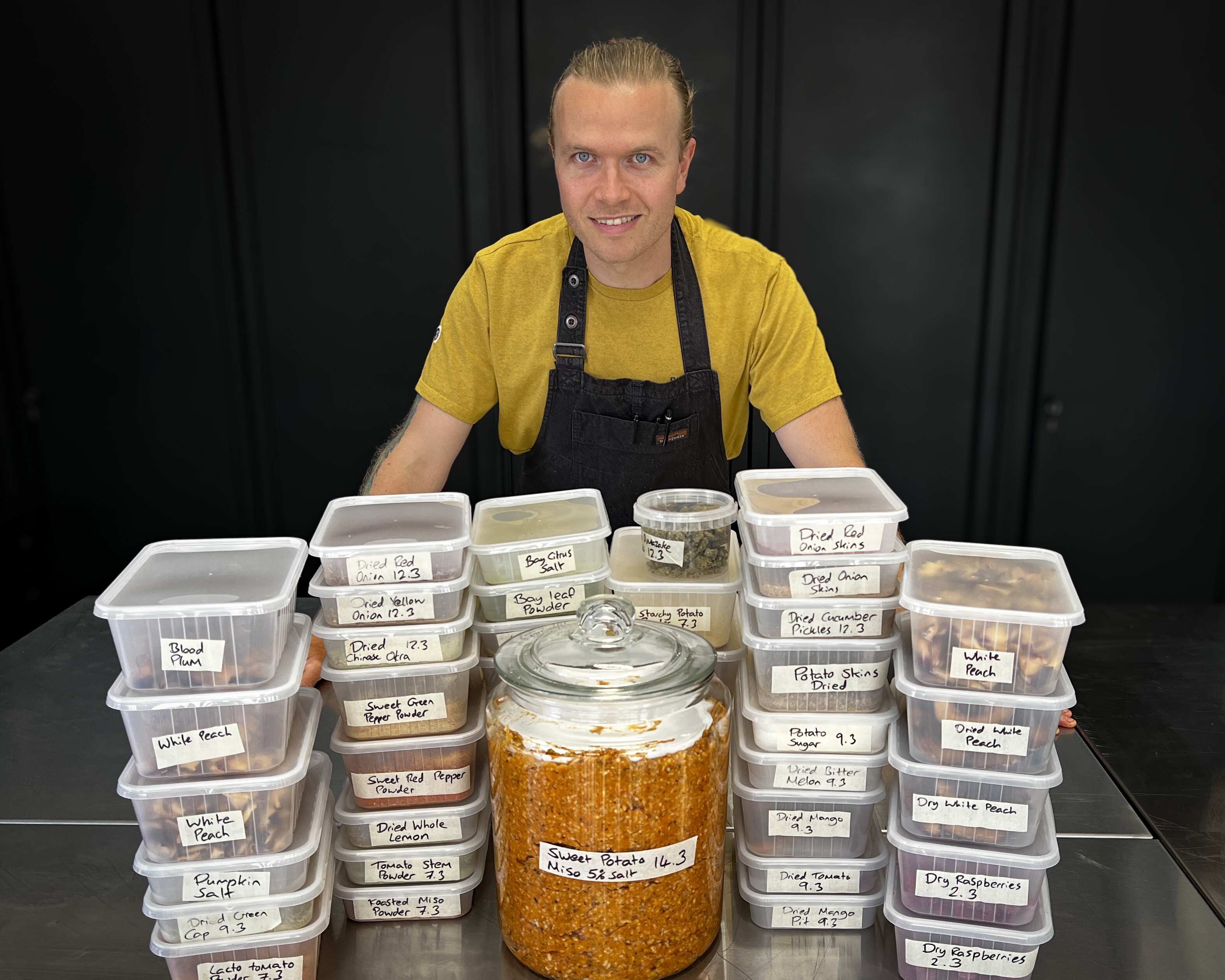Eco Chef Chris Locke with food diverted into ingredients for long shelf-life products.
