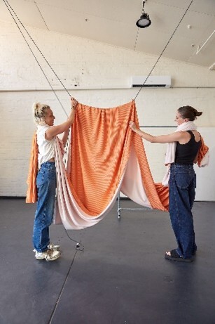 Circular Sourcing Team, Lily Clatworthy and Courtney Holm, using deadstock in a campaign shoot for the CS platform. Photo by Michelle Nace