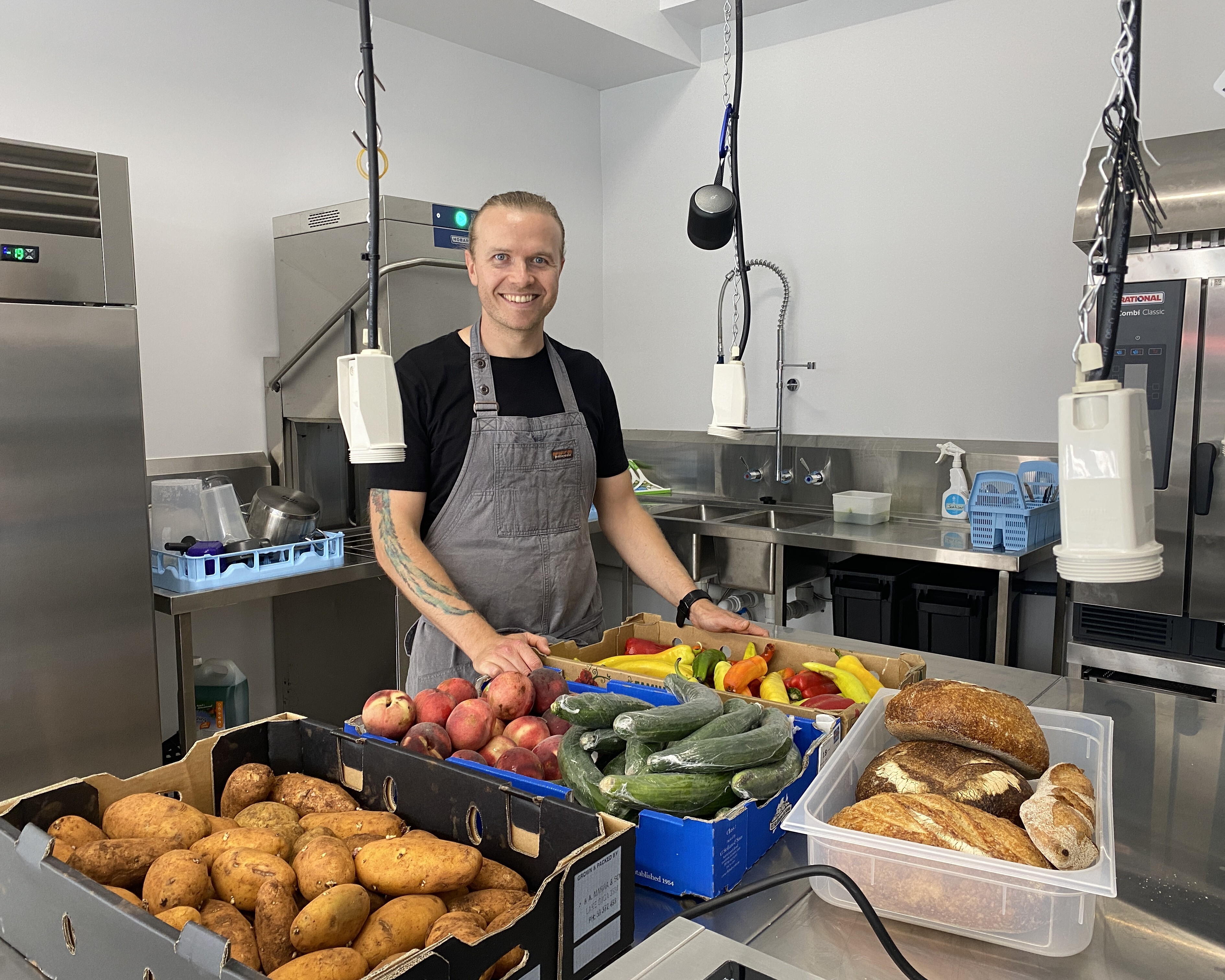 Eco Chef Chris Locke with rescued food from the Queen Victoria Market.